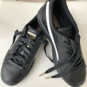 Puma black and white sneakers